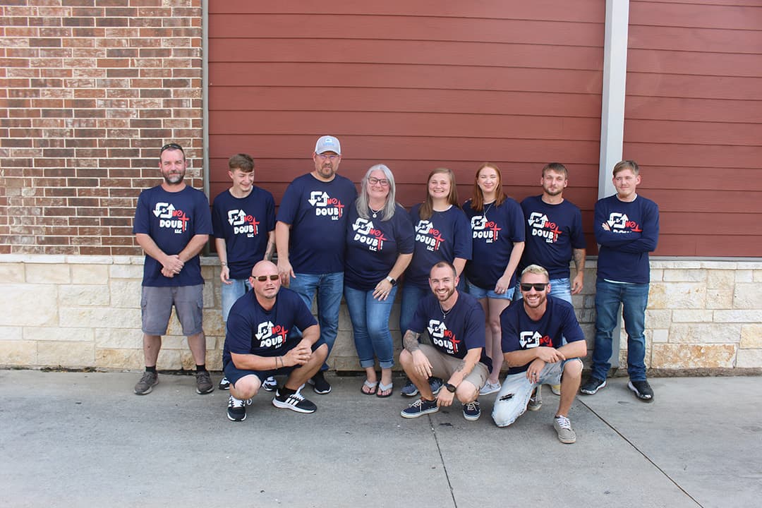 In and Out No Doubt crew helping a family settle into their new East Texas home